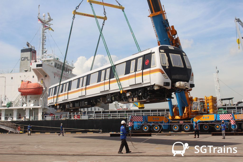 The Kawasaki-CRRC Sifang T251 train for the Thomson-East Coast Line (TEL) being lifted up by a crane during delivery.