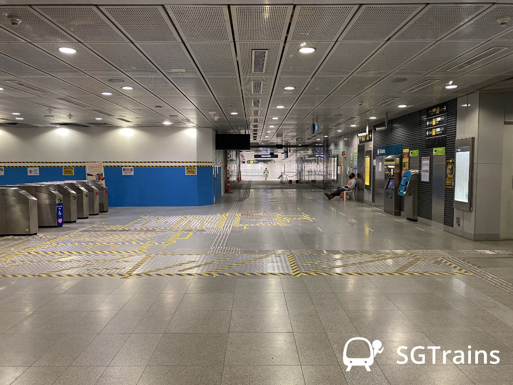 Markings are made on the floor to relocate the faregates for the transfer area between Circle Line and Thomson-East Coast Line.