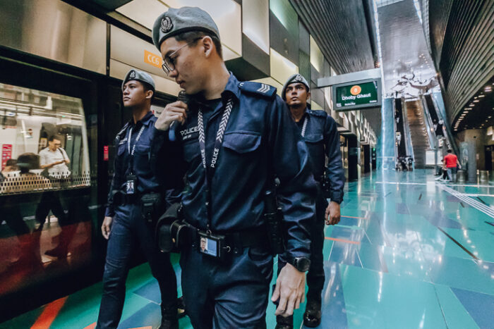 TransCom officers patrolling Stadium MRT station. (Photo: Muhamad Khair/MHA)