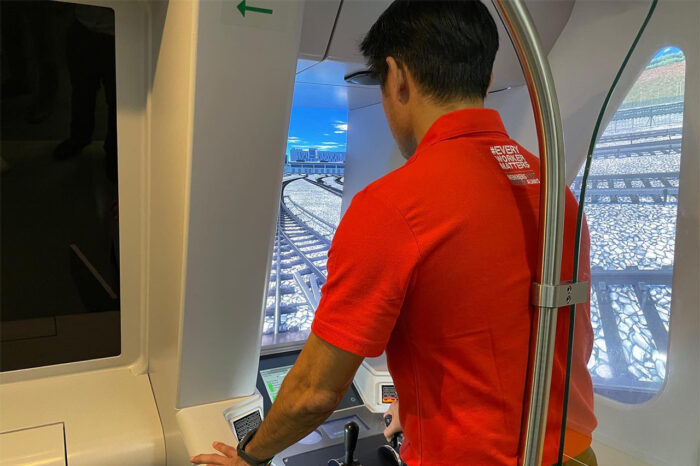 Mr Desmond Tan, Deputy Secretary-General of the National Trades Union Congress (NTUC) and Minister of State in the Prime Minister’s Office, trying out the Downtown Line (DTL) train simulator at Sengkang Depot. (Photo: Desmond Tan/Facebook)