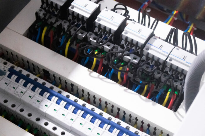 Picture for Illustration: Electrical circuits in a fuse box. (Image: mostafa mahmoudi/Unsplash)