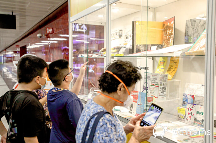 Visitors viewing the train memorabilia at Friends of Land Transport Booth during TEL3 Opening Event in 2022. (Image: SGTrains File)